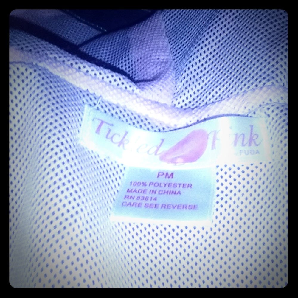 Tinked pink  top and bottom pants and shirt